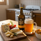 aperitivo con birra artigianale italiana chiara, formaggio vegetale, taralli e pomodorini
