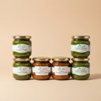 Box di piatti pronti all'uso in vetro. Due confezioni di cicoria e fagioli piattelle, due confezioni di zuppa di legumi e farro, due confezioni di pizza e minestra